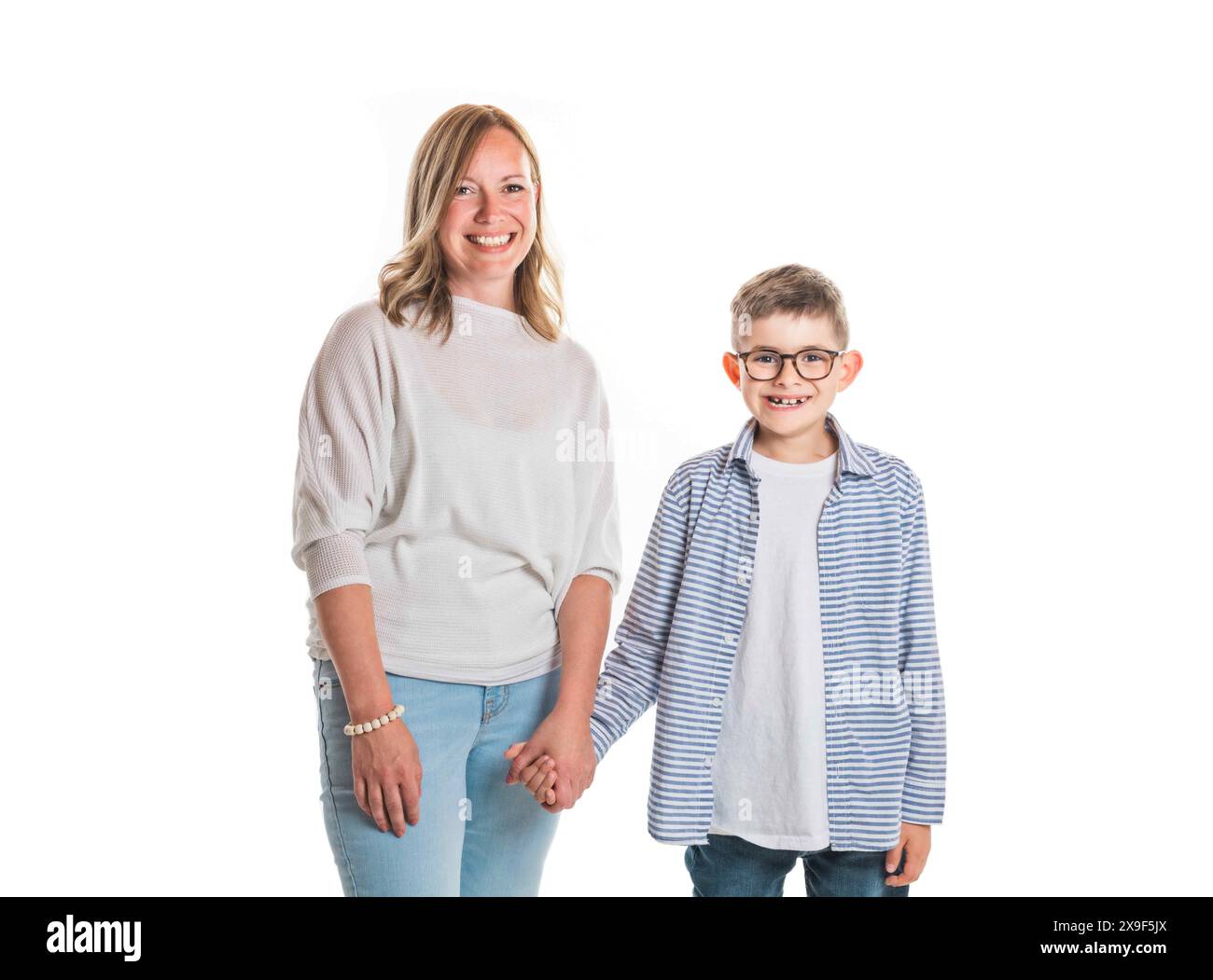 Photo of mother and adorable young happy boy looking at camera Stock ...
