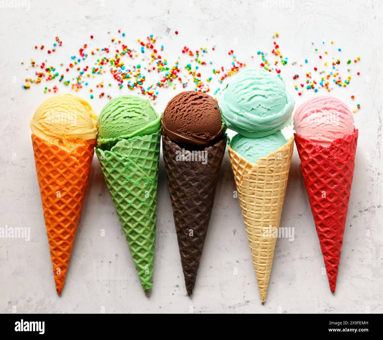 assorted ice cream of different flavors in waffle cones Stock Photo - Alamy