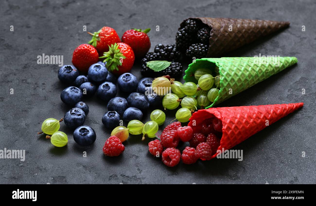 assorted ice cream of different flavors in waffle cones Stock Photo - Alamy