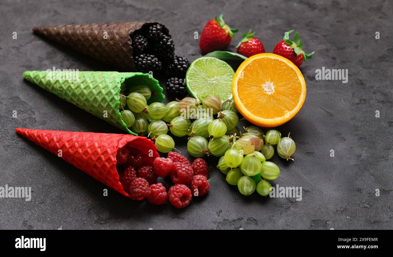 assorted ice cream of different flavors in waffle cones Stock Photo - Alamy