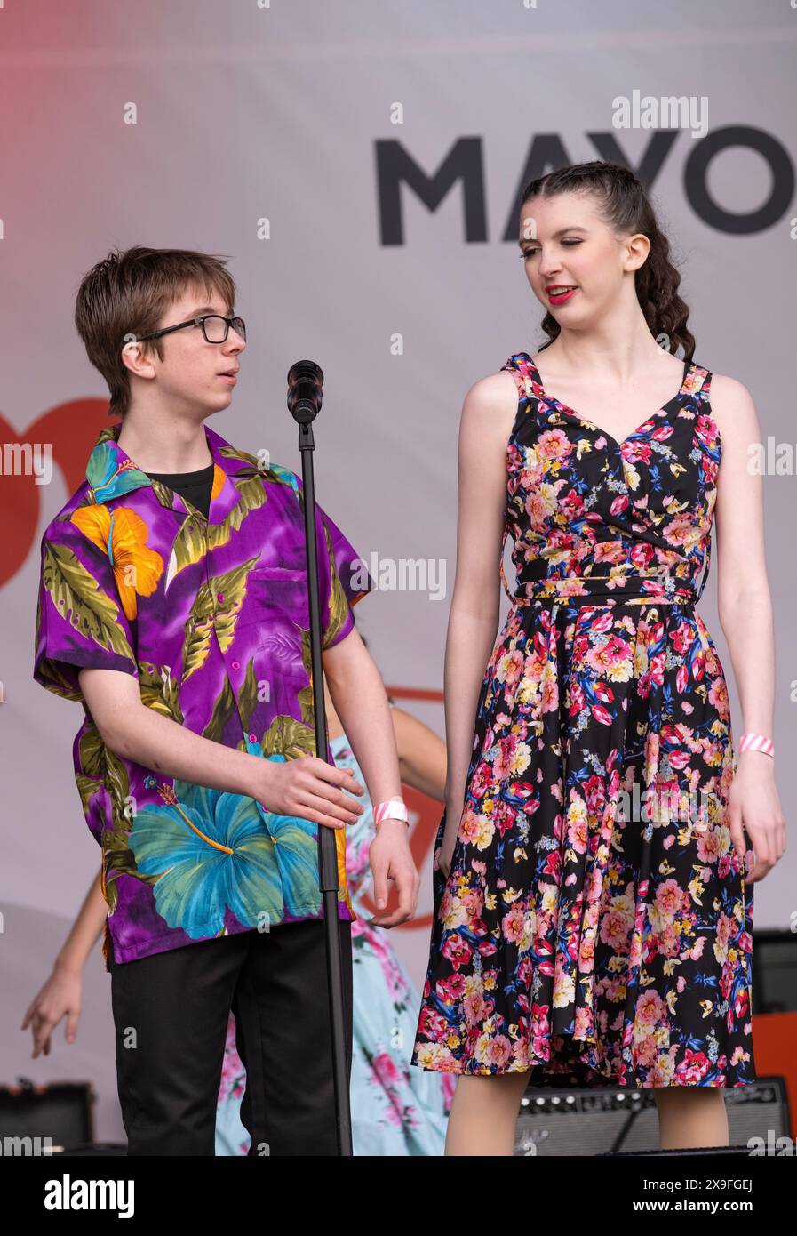 Abigail Higgs and Kaspar Chill-Ritter from the West End Kids Troupe, performing at the Mayor of London's St. George's Day Celebration. Stock Photo