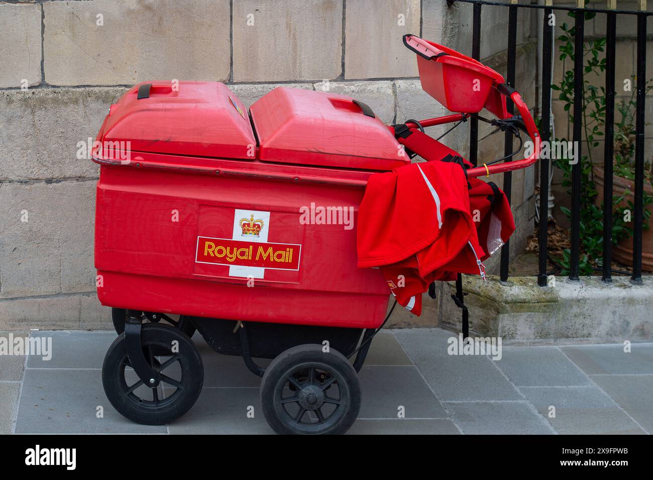 Windsor, UK. 31st May, 2024. A Royal Mail post cart in Windsor, Berkshire. The owner of Royal Mail, International Distribution Services, has reportedly accepted a £3.5bn takeover bid from a Czech billionaire, Daniel Kretinsky, Kretinsky's EP Group. The sale of Royal Mail, is however, subject to shareholder and Government approval. The National Security and Investment Act 2021, gives Government ministers the power to block the sale of companies that are considered part of critical national infrastructure. Credit: Maureen McLean/Alamy Stock Photo
