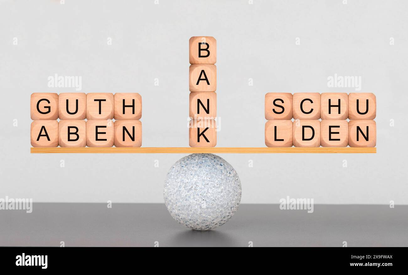 Guthaben und Schulden Guthaben und Schulden im Gleichgewicht *** Assets and liabilities Assets and liabilities in balance Stock Photo