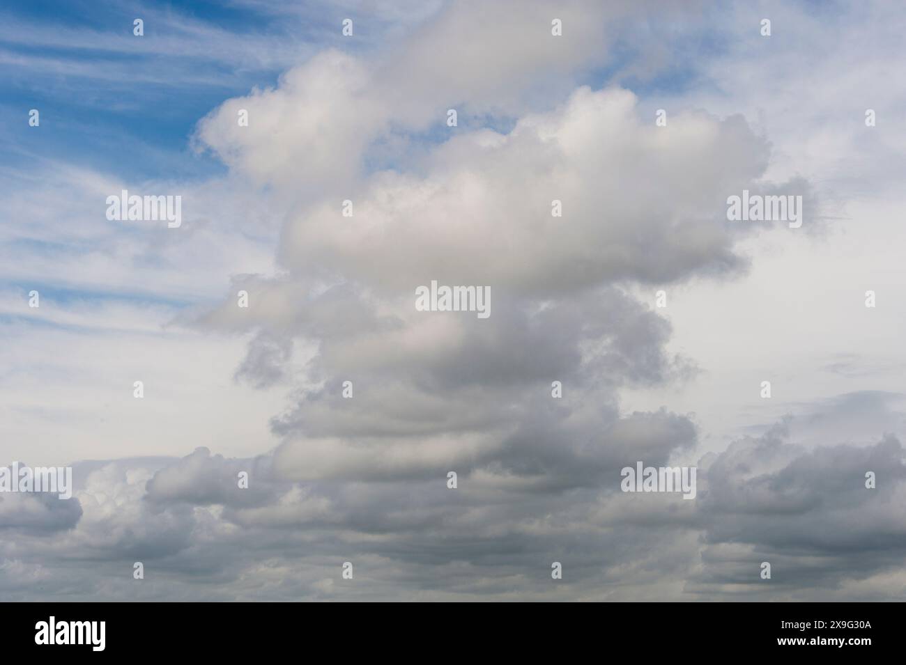 white whispy clouds and blue sky cloudscape Stock Photo