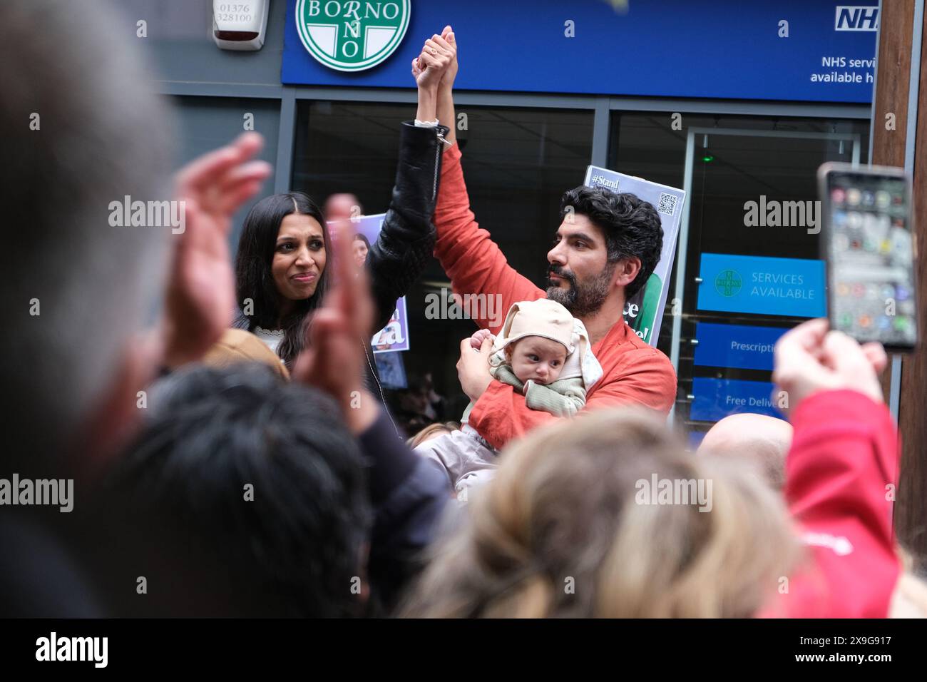 Former Labour candidate for Chingford and Woodford Green Faiza Shaheen and her husband at a rally after she was deselected by the Labour party Stock Photo