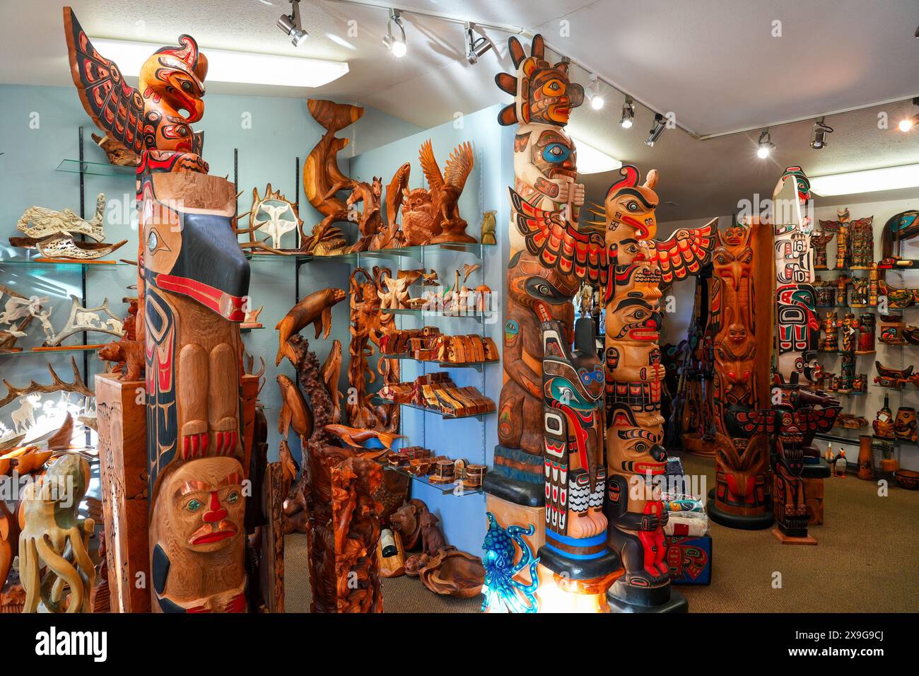 Wooden statues, totem poles and other native american artwork inside