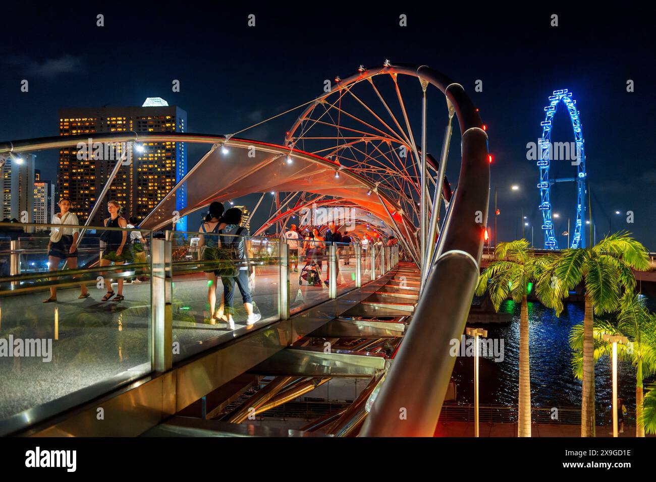 The Helix bridge at Marina Bay and Singapore Flyer, Singapore, Southeast Asia, Asia Stock Photo