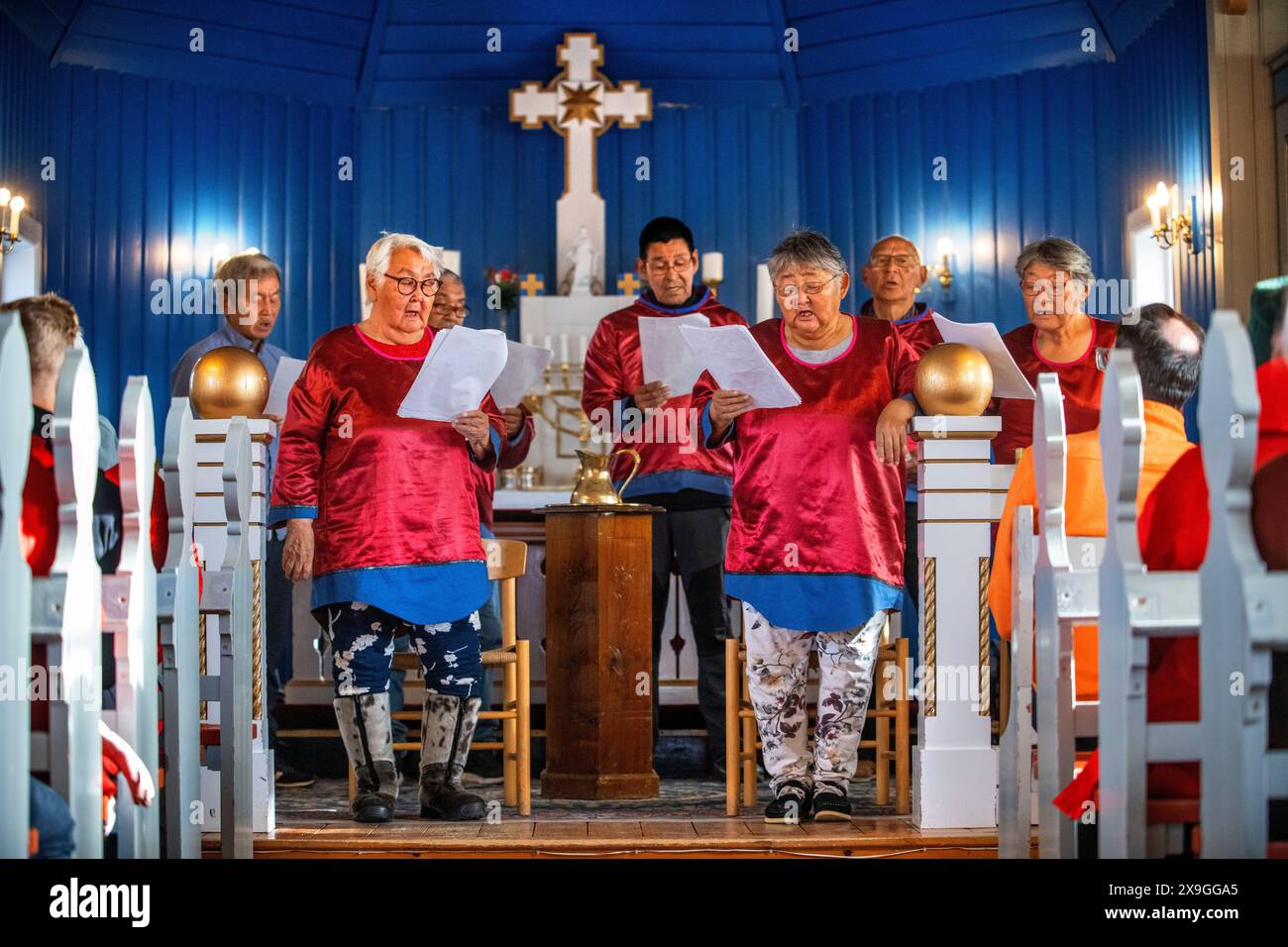 Inuit choir in traditional dresses, Nanortalik church Island of Qoornoq ...