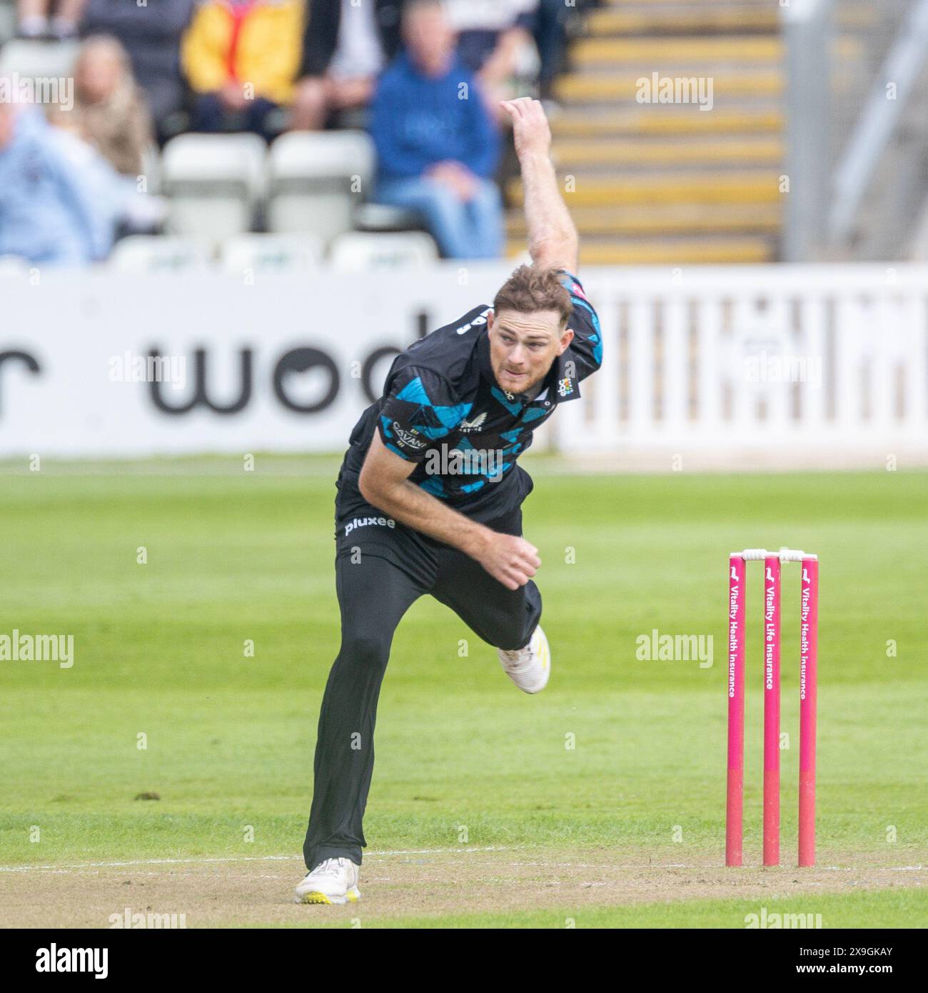 Tom Taylor bowls to claim the 3rd wicket for Worcestershire taken in