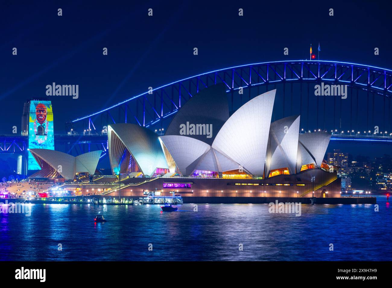 Sydney, Australia, 31 May 2024. Pictured:  Special lighting adorns Sydney Harbour during the 2024 'Vivid Sydney' light festival. Pictured: Sydney Opera House and Sydney Harbour Bridge seen from Farm Cove. Credit: Robert Wallace / Wallace Media Network / Alamy Live News Stock Photo