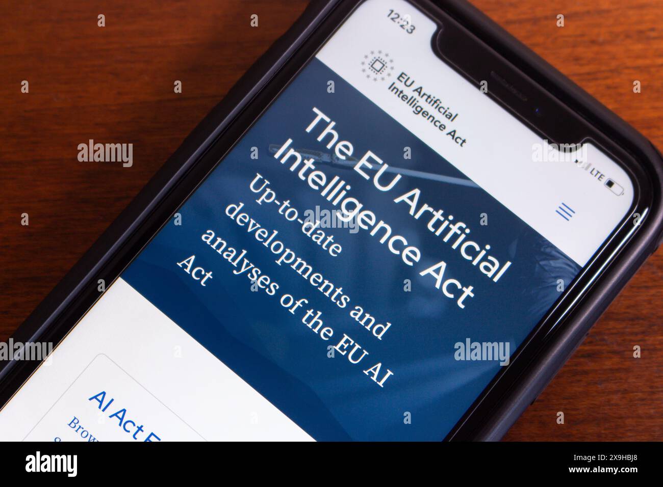 EU Artificial Intelligence Act website seen in an iPhone. EU AI Act is a law established by the European Union to regulate the use of AI technology Stock Photo