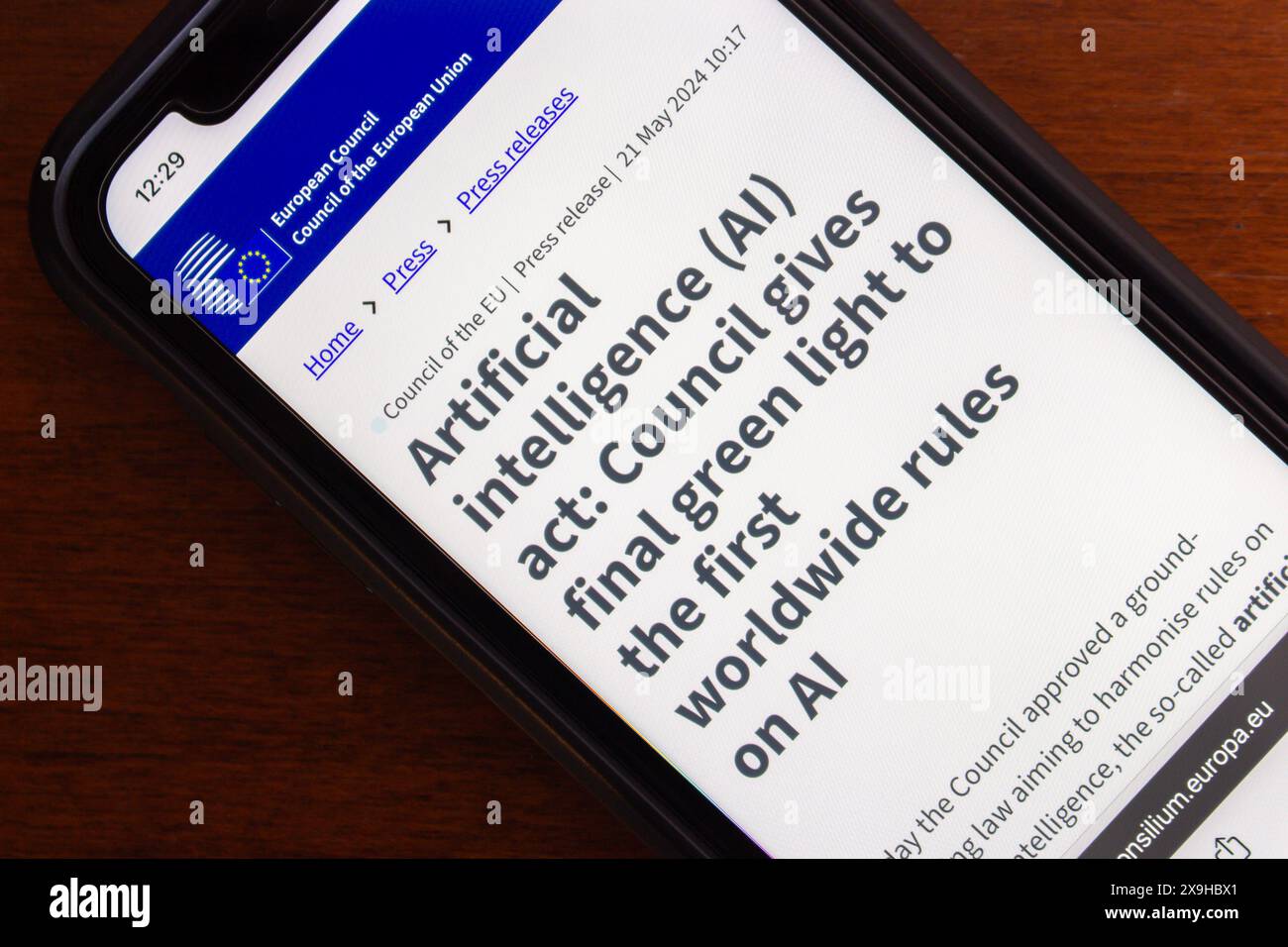 'Artificial intelligence (AI) act: Council gives final green light to the first worldwide rules on AI” seen in an iPhone. Stock Photo
