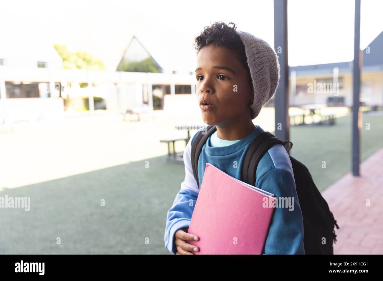 Biracial boy at school, with copy space Stock Photo - Alamy