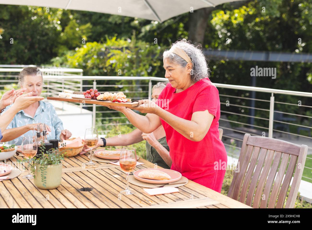 Diverse senior friends sharing hi-res stock photography and images - Alamy