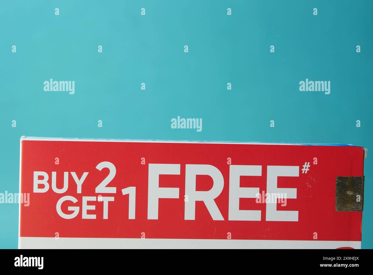 buy 2 get 1 free offer on a packet  Stock Photo