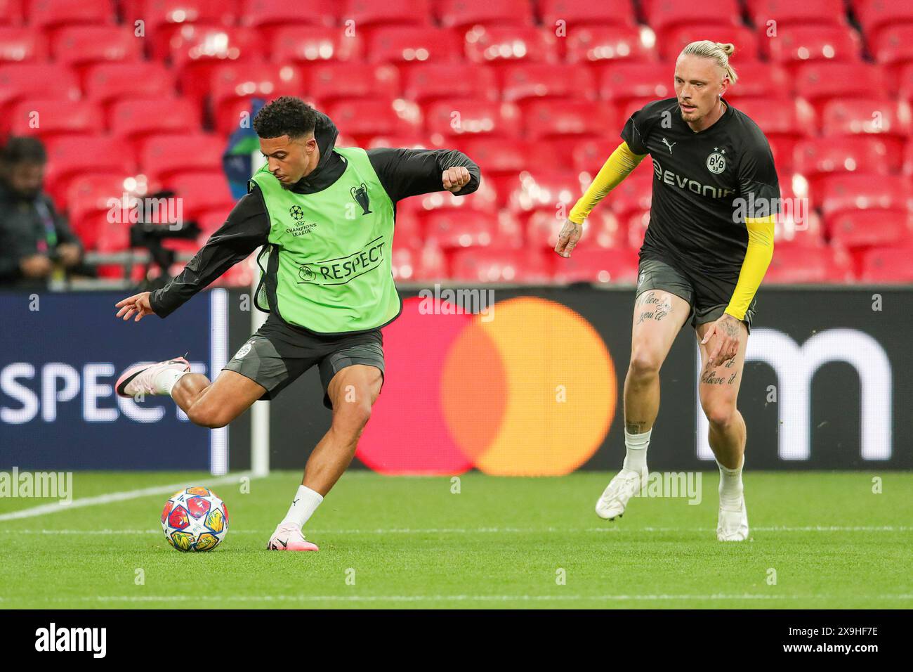 London, UK. 31st May, 2024. Jadon Sancho (L) and Marius Wolf of Borussia Dortmund (R) seen during training session ahead of their UEFA Champions League Final against Real Madrid at Wembley. Credit: SOPA Images Limited/Alamy Live News Stock Photo