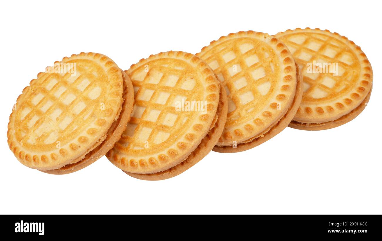 Sandwich biscuits with filling on a white background Stock Photo