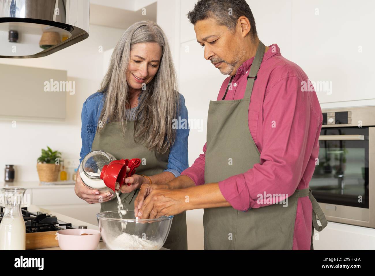couple-wearing-aprons-pouring-hi-res-stock-photography-and-images-alamy