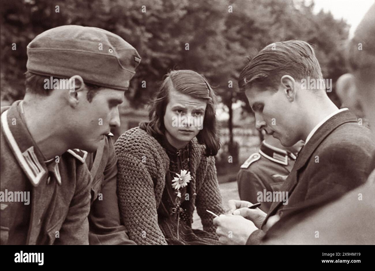 Hans Scholl (left), Sophie Scholl (middle) and Christoph Probst of the underground Nazi resistance group known as the White Rose in Munich, Germany, in 1942. On February 22, 1943, all three were executed by guillotine. Stock Photo