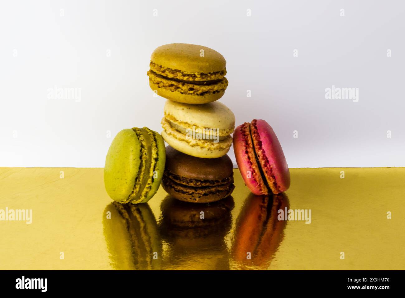 colorful macaroons on a wooden table Stock Photo