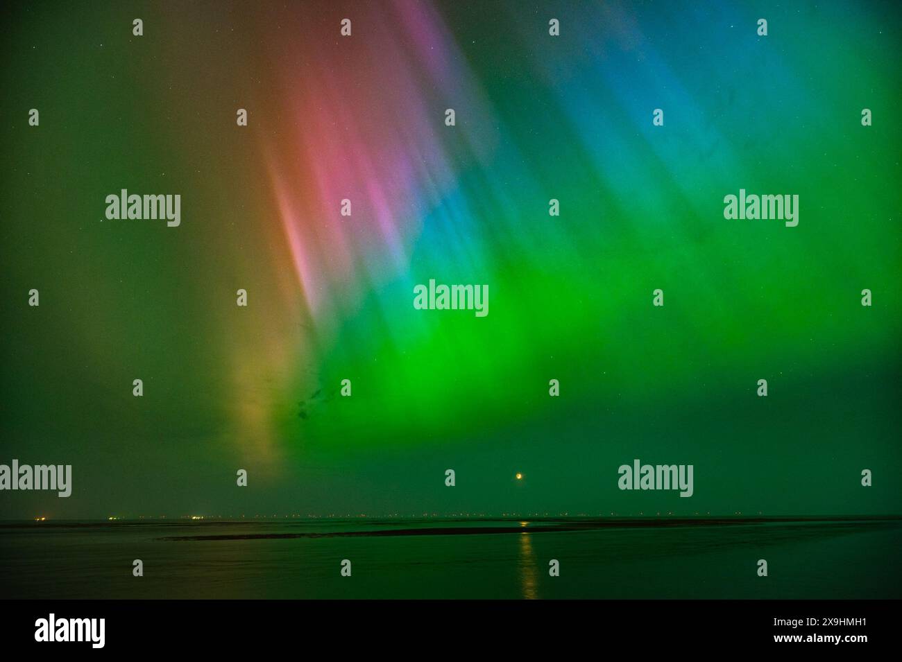 Northern lights (Aurora borealis) in a various colors over the North