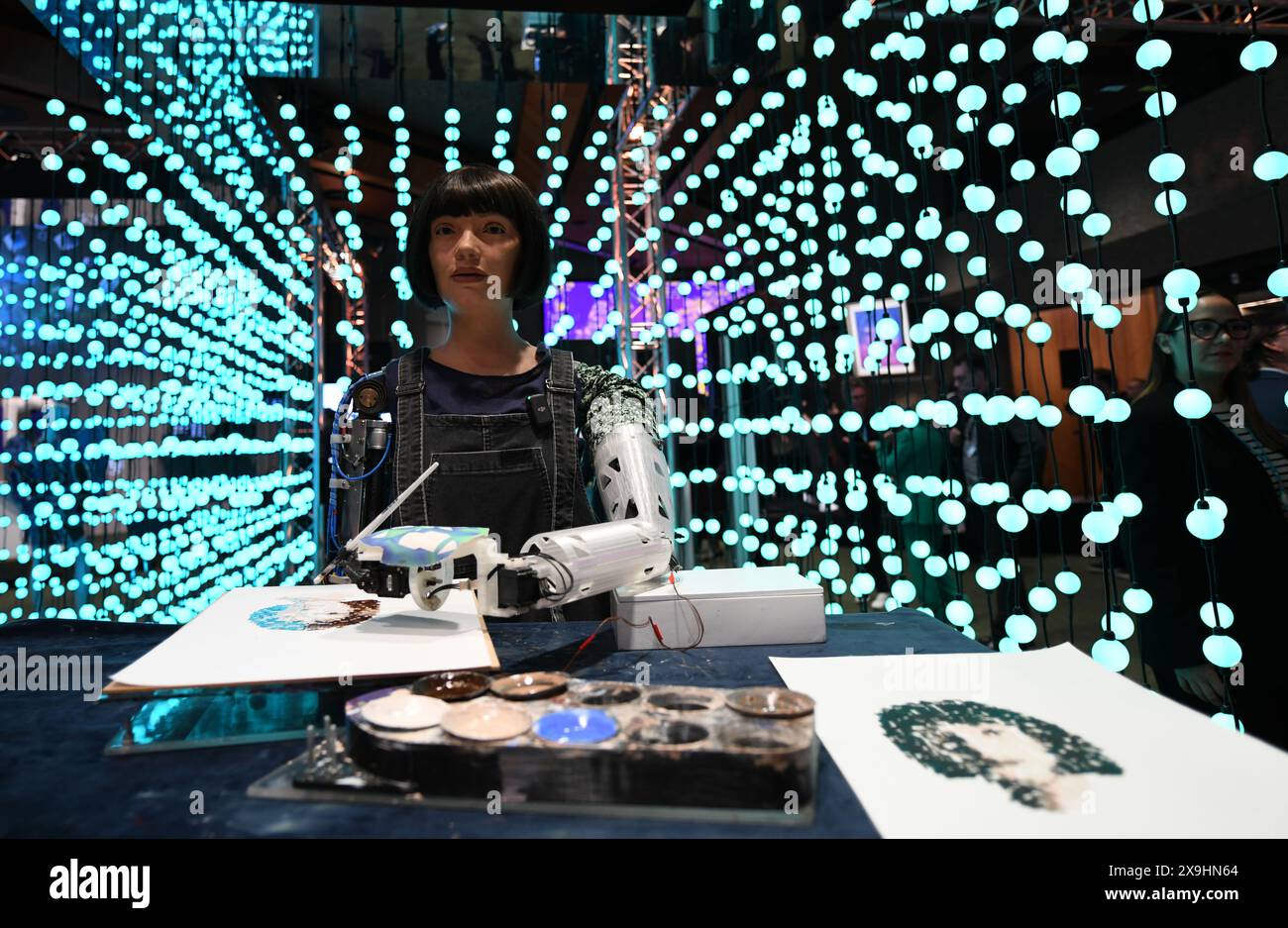 Beijing, Switzerland. 30th May, 2024. Robot artist Ai-Da draws at the 2024 Artificial Intelligence (AI) for Good Global Summit in Geneva, Switzerland, May 30, 2024. Credit: Lian Yi/Xinhua/Alamy Live News Stock Photo