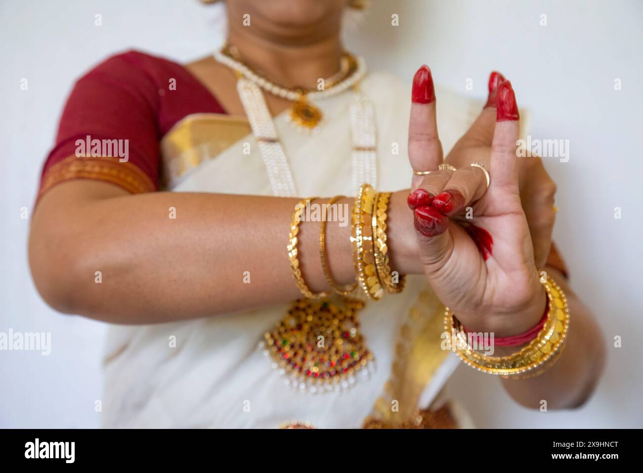 Bharatanatyam Indian classical dance mudra (pose) demonstrated by woman Indian classical dancer. Stock Photo