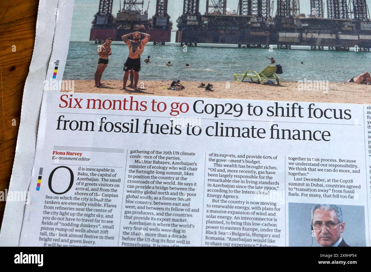 'Six months to go Cop29 to shift focus from fossil fuels to climate finance' Guardian newspaper headline environment article 18 May 2024 London UK Stock Photo