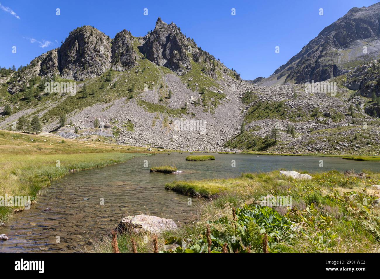 The lower lake of the Ischiator in the Maritime Alps in the municipality of Vinadio, in the province of Cuneo, altitude of 2094 metres, Piedmont, Ital Stock Photo