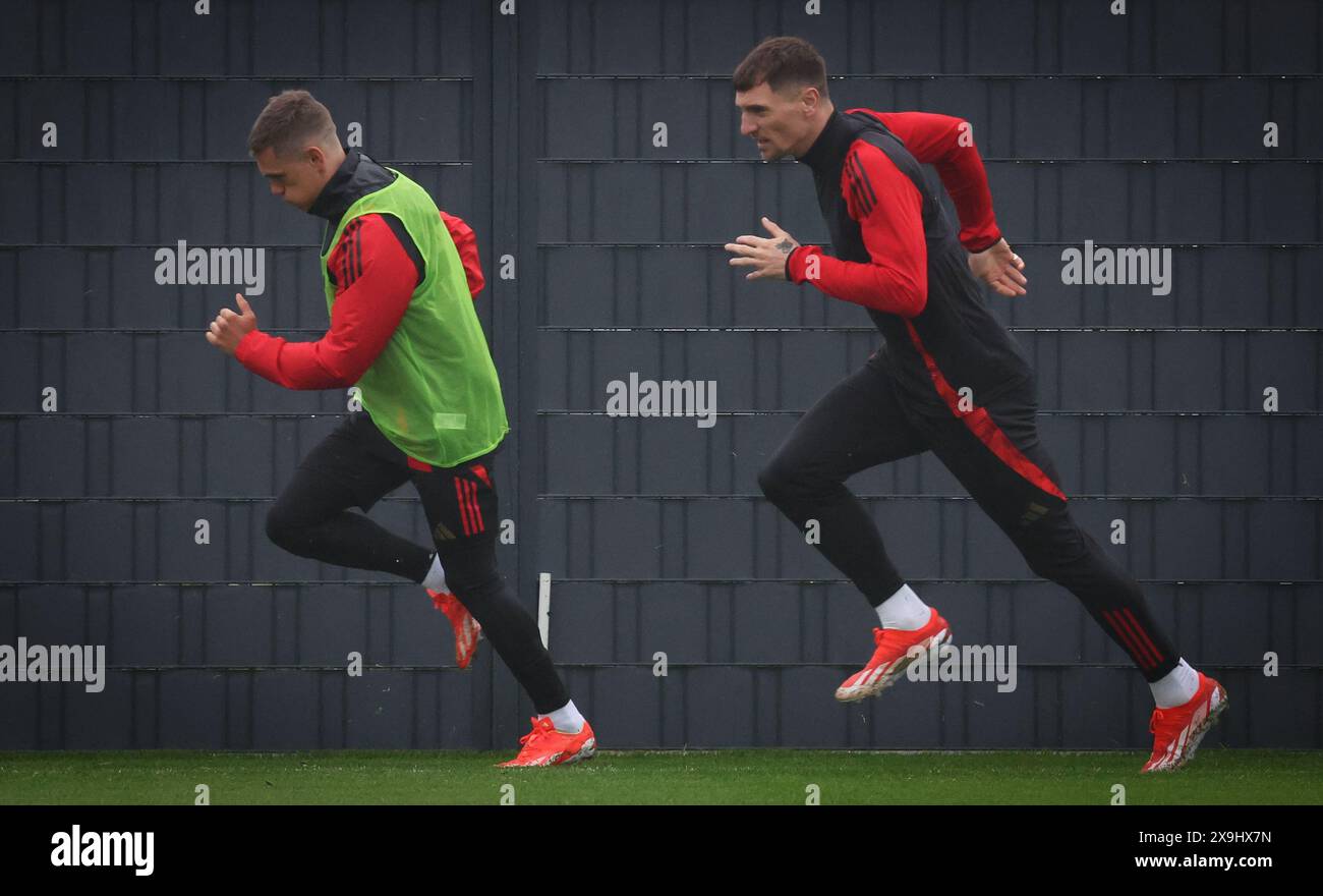Belgium's Leandro Trossard and Belgium's Thomas Meunier pictured in action during a training session of the Belgian national soccer team Red Devils, at the Royal Belgian Football Association's training center in Tubize, Saturday 01 June 2024. The Red Devils are preparing for the Euro 2024 European Championships in Germany. BELGA PHOTO VIRGINIE LEFOUR Stock Photo