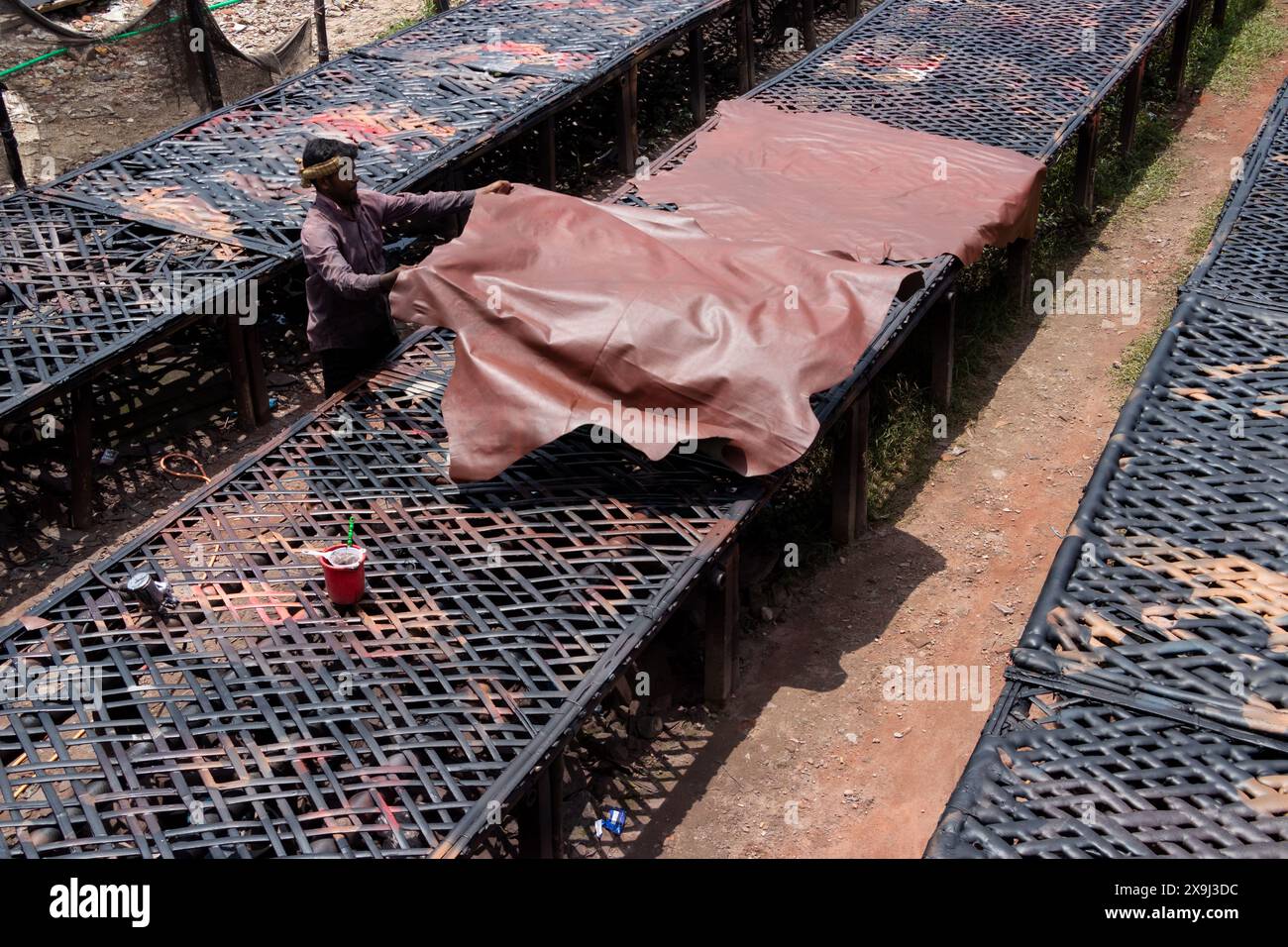 Leather processing workers machine hi-res stock photography and images ...