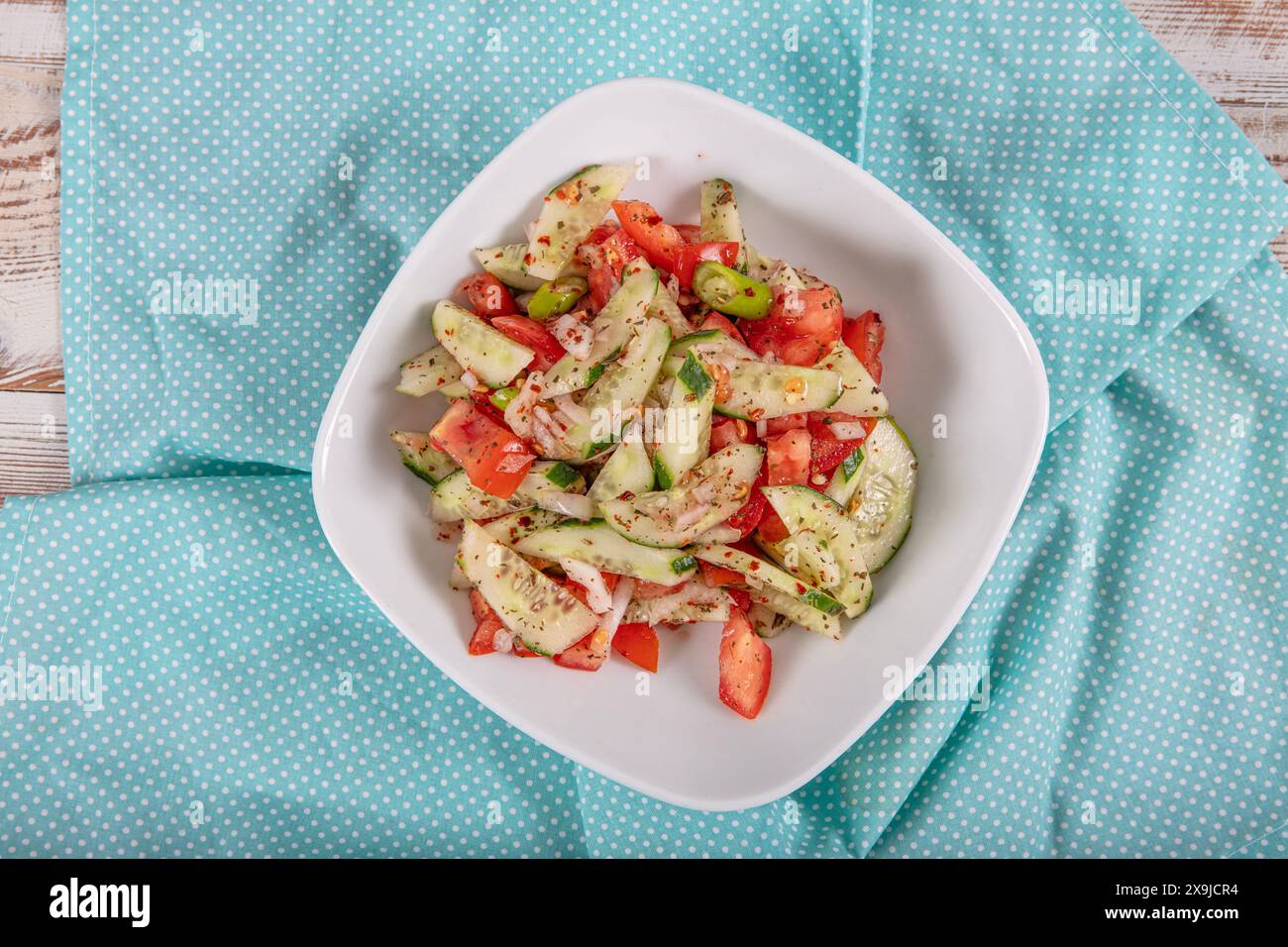 Turkish Coban (choban) salata or Shepherds salad in white bowl. Turkish ...