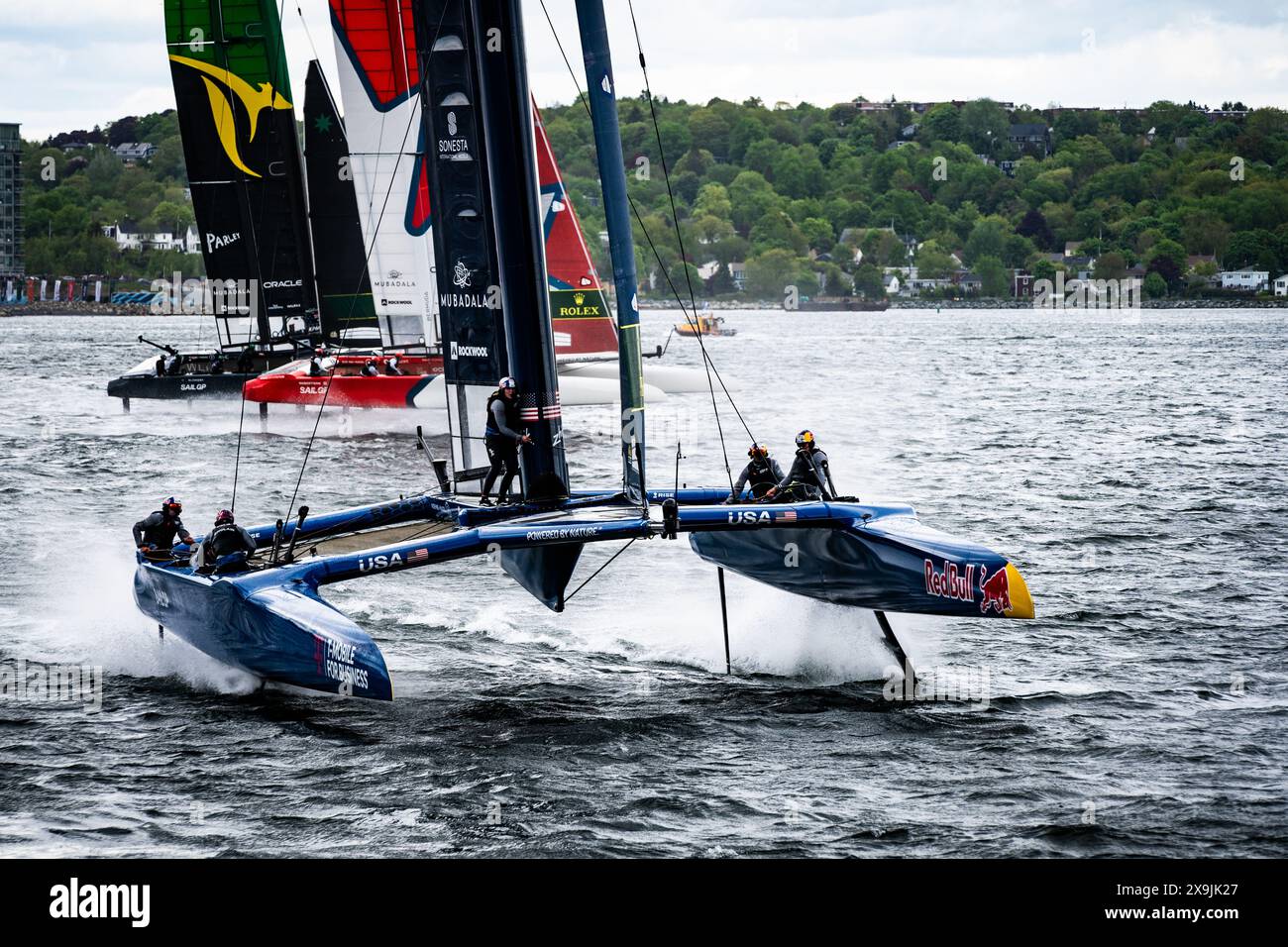 Team USA with Team Canada and Team Australia in the background during the June 2024 Sail GP