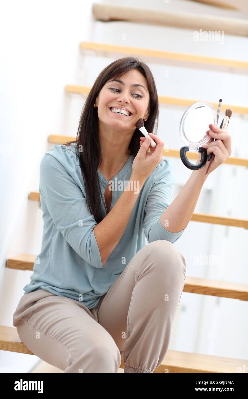 Woman sitting on toilet happy hi-res stock photography and images - Alamy