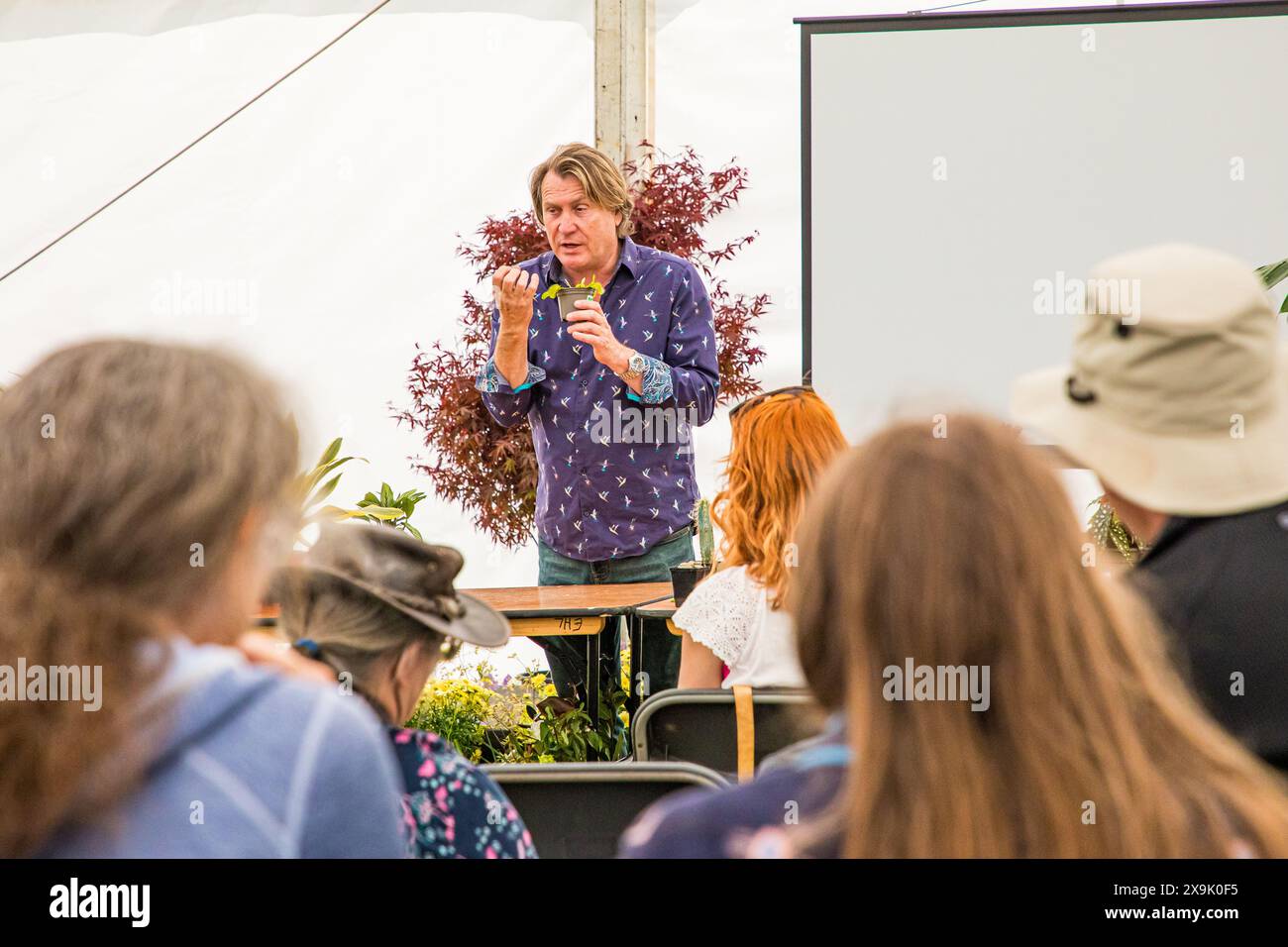 SHEPTON MALLET, SOMERSET, UK, 1st June, 2024, Celebrity gardener and horticulturist, David Domoney, speaking and giving gardening tips at The Royal Bath and West Show 2024. Credit John Rose/Alamy Live News Stock Photo