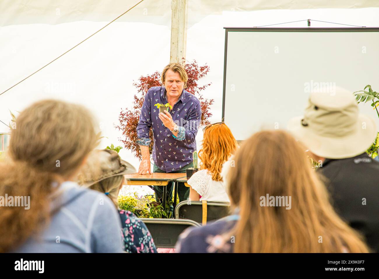 SHEPTON MALLET, SOMERSET, UK, 1st June, 2024, Celebrity gardener and horticulturist, David Domoney, speaking and giving gardening tips at The Royal Bath and West Show 2024. Credit John Rose/Alamy Live News Stock Photo