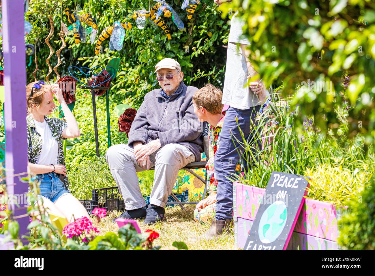 SHEPTON MALLET, SOMERSET, UK, 1st June, 2024, colourful image showing people enjoying the sunshine and chilling out in the horticulture areas at the Royal Bath and West Show 2024. Credit John Rose/Alamy Live News Stock Photo