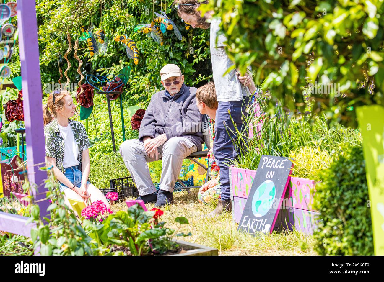 SHEPTON MALLET, SOMERSET, UK, 1st June, 2024, colourful image showing people enjoying the sunshine and chilling out in the horticulture areas at the Royal Bath and West Show 2024. Credit John Rose/Alamy Live News Stock Photo