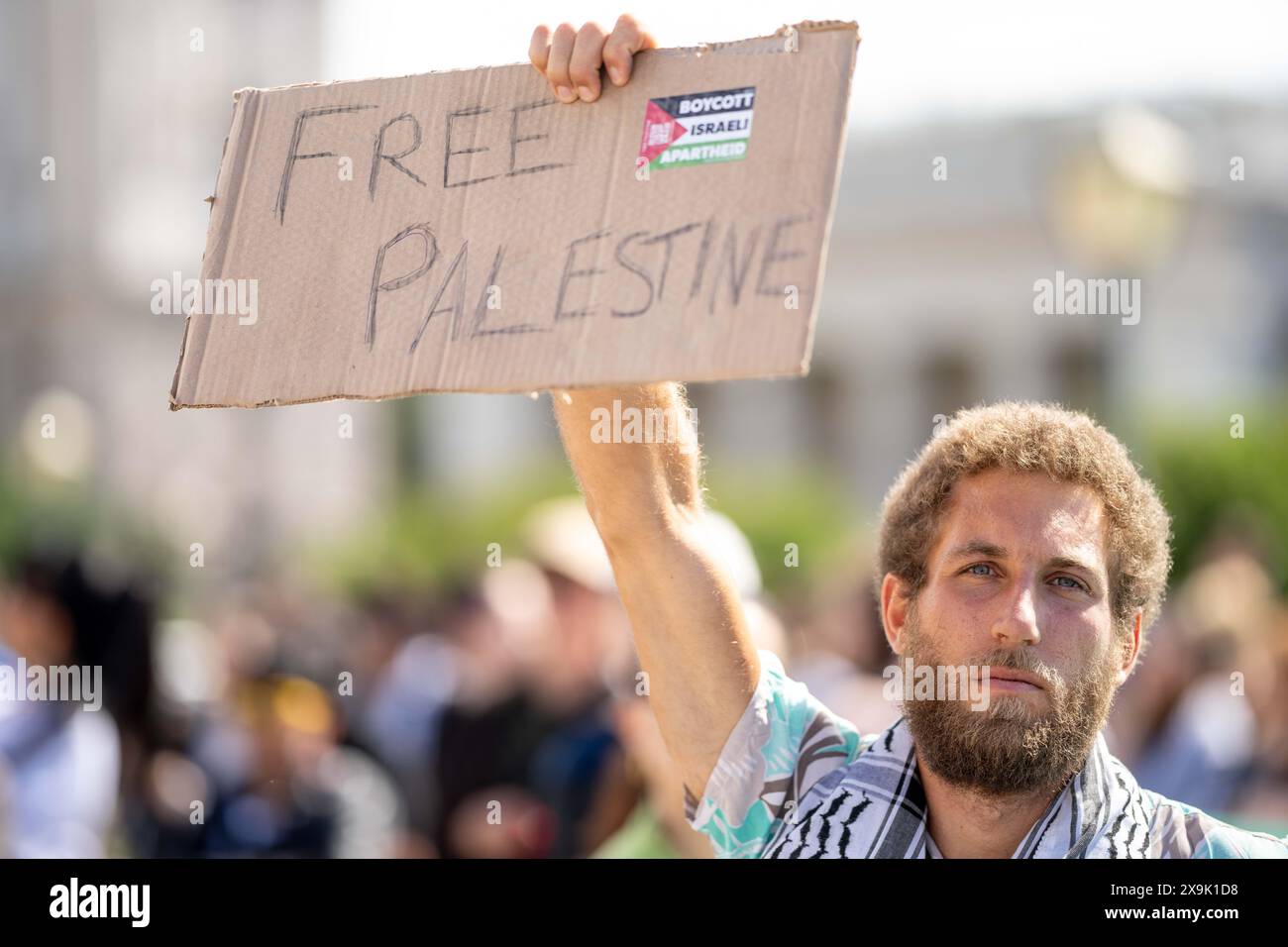 June 1, 2024, Vienna, Vienna, Austria: Person holding Free Palestine sign at pro-Palestine protest at the Heldenplatz in Vienna. The protester demand an immediate ceasefire to avoid further casualties and the recognition of the Palestinian state. (Credit Image: © Andreas Stroh/ZUMA Press Wire) EDITORIAL USAGE ONLY! Not for Commercial USAGE! Stock Photo