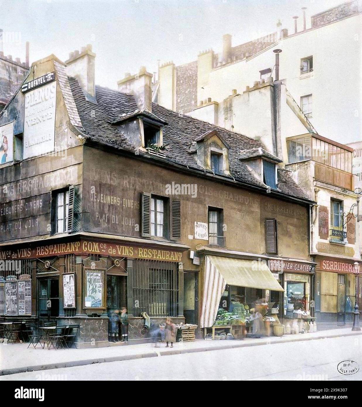 Colourised vintage photograph of Entrée du Village du Roule, 8th arrondissement, Paris Taken in 1890 by an anonymous photographer colorized image 19th century French streetscene Stock Photo