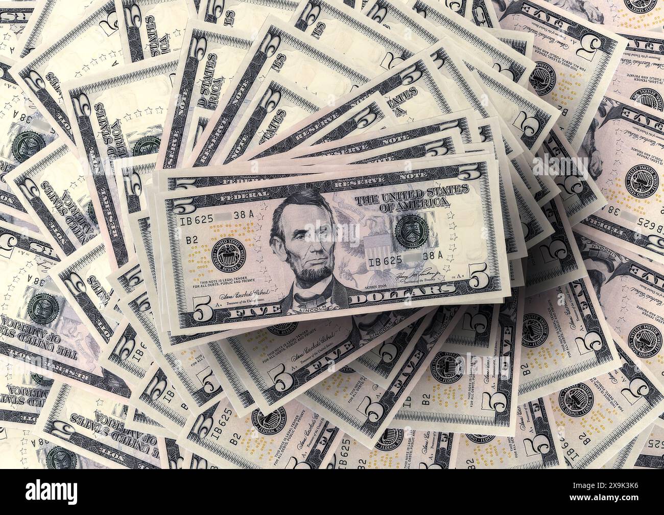 Five US dollar bills Stock Photo