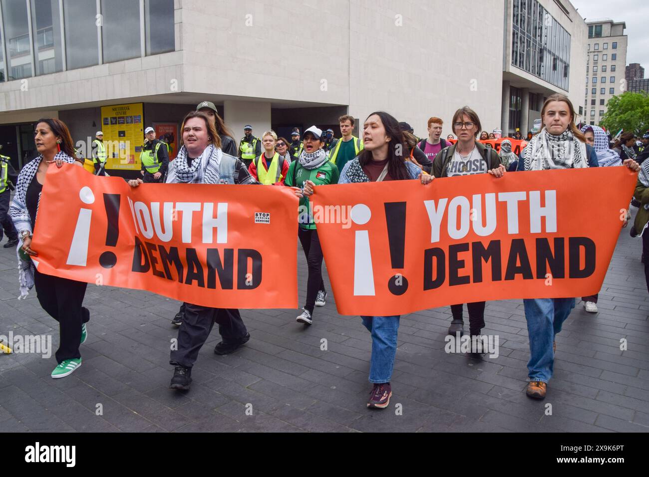 London, UK. 1st June 2024. Protesters pass by Southbank Centre. Activists from the group Youth Demand marched in solidarity with Palestine as Israel continues its attacks on Gaza. Credit: Vuk Valcic/Alamy Live News Stock Photo
