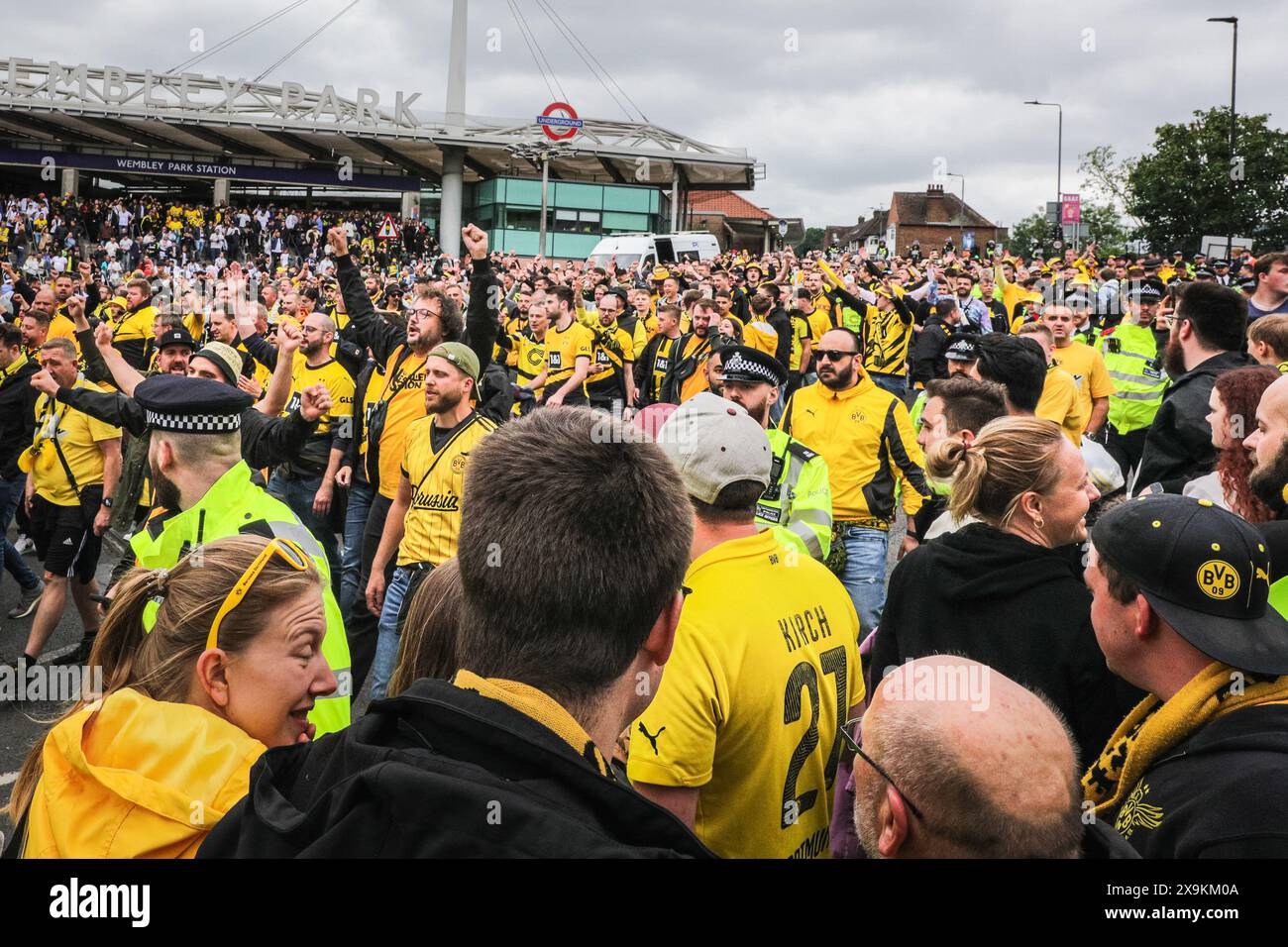 London, UK. 01st June, 2024. The 'Ultras', BVB hardcore fans arrive under police escort. Fans of both clubs arrive and make their way along Olympic Way to the stadium. The UEFA Champions League Final between Real Madrid and Borussia Dortmund will kick off at 8pm GMT at Wembley Stadium today. Credit: Imageplotter/Alamy Live News Stock Photo