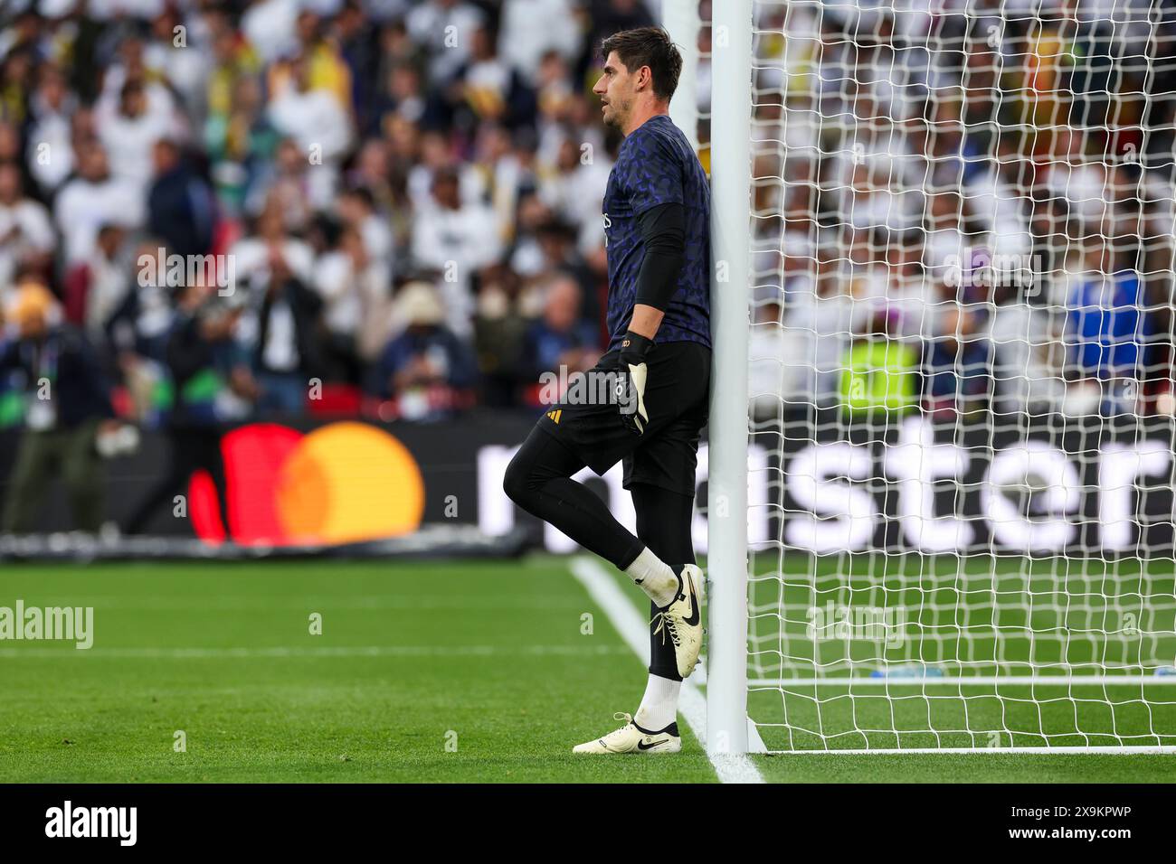 Real Madrid's goalkeeper Thibaut Courtois warms up befoew the Champions ...