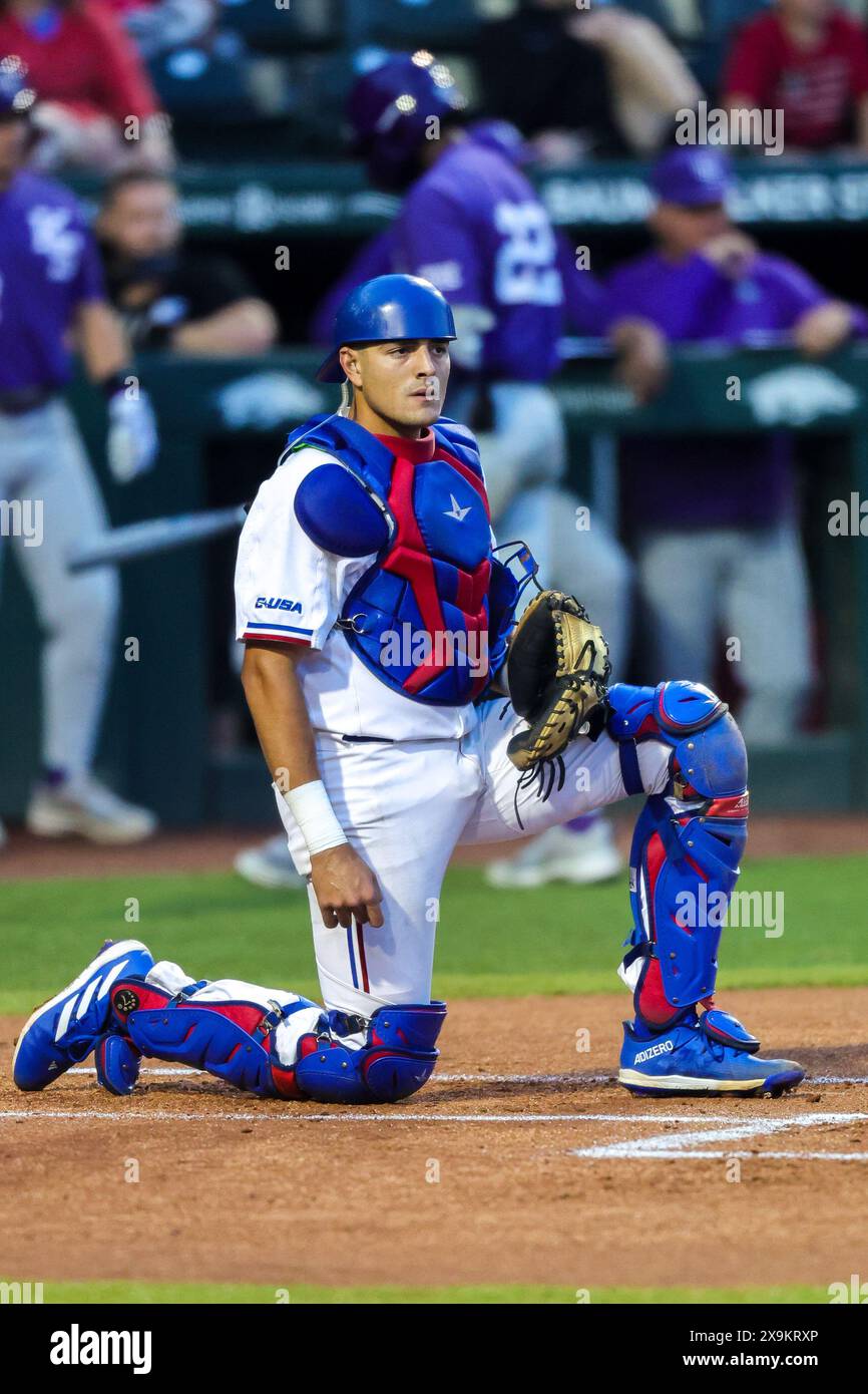 May 31, 2024: Bulldogs catcher Jorge Corona #12 pulls off his mask while they review a play on the field. Kansas State defeated Louisiana Tech 19-4 in Fayetteville, AR. Richey Miller/CSM Stock Photo