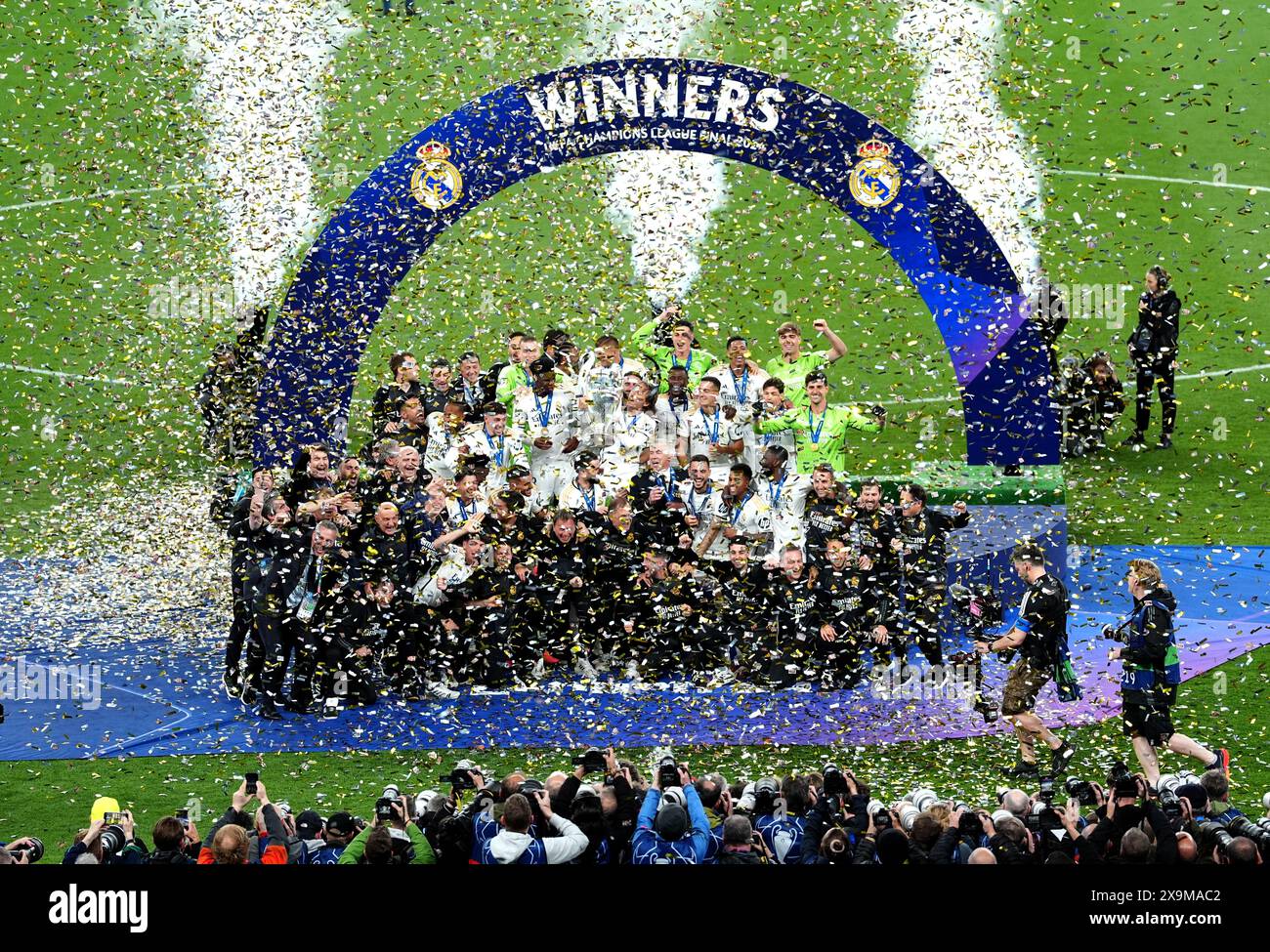 Real Madrid players and staff celebrate after winning the UEFA ...