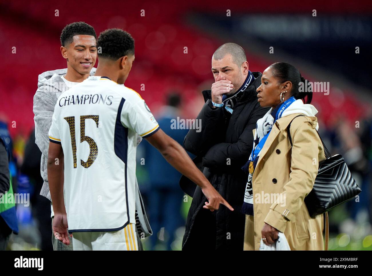 Real Madrid's Jude Bellingham speaks to his parents Mark Bellingham