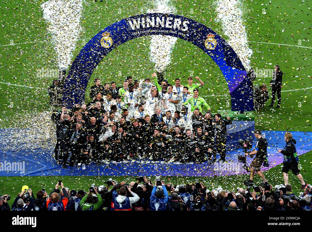 Real Madrid players and staff celebrate after winning the UEFA ...