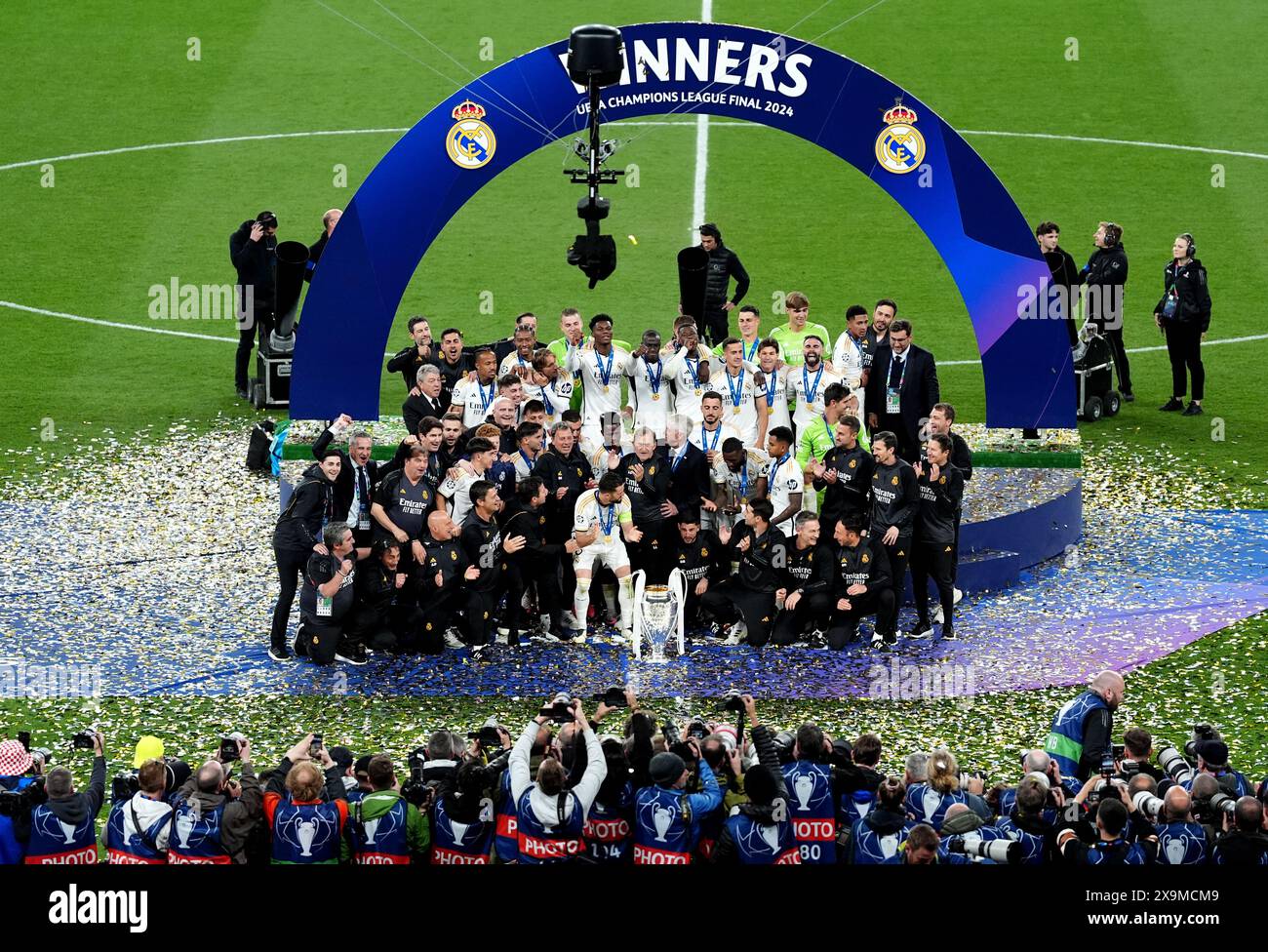 Real Madrid players and staff celebrate after winning the UEFA ...