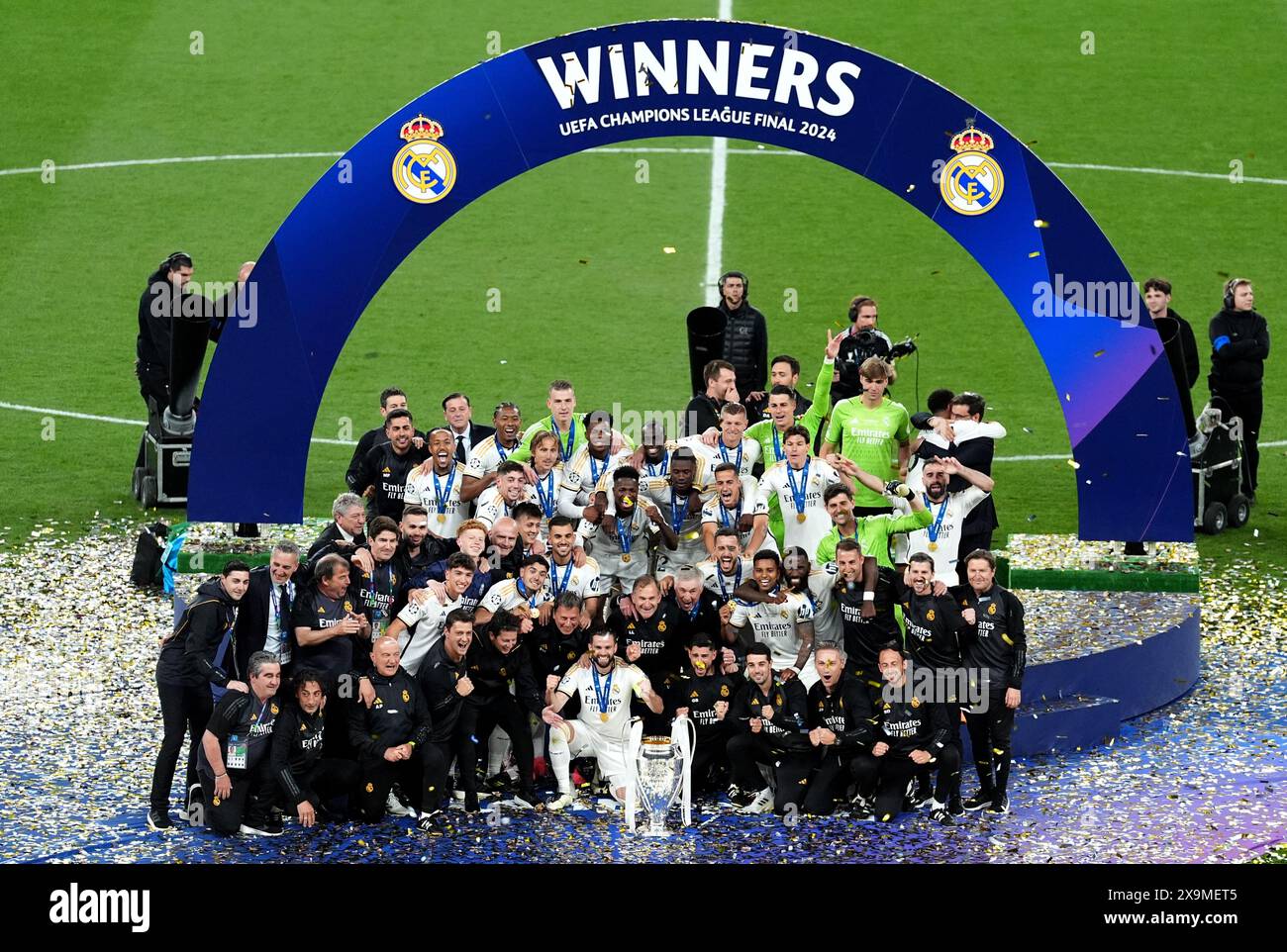 Real Madrid players and staff celebrate after winning the UEFA ...